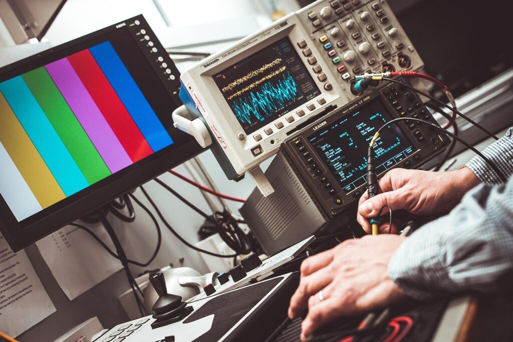 Galaxy Tech engineer using a high-bandwidth Agilent oscilloscope for 100% signal validation and integrity testing on semiconductor circuit assemblies.