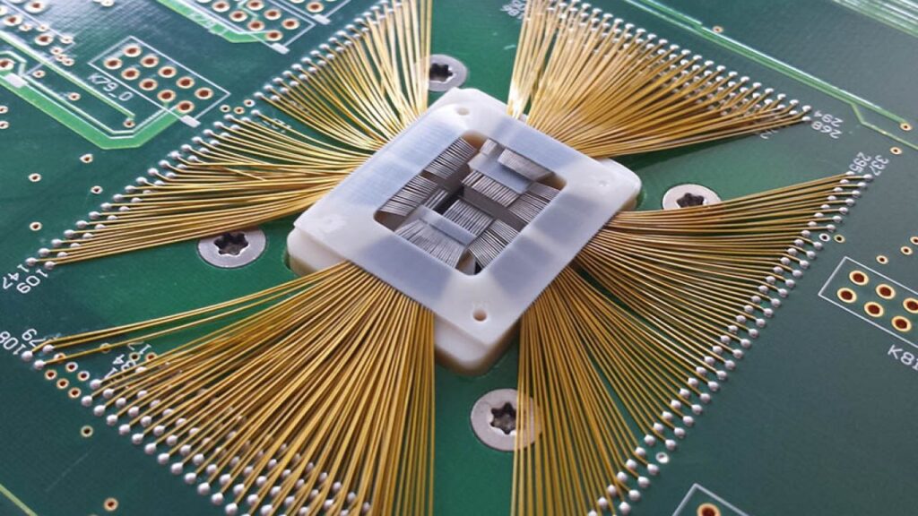 Detailed macro view of high-precision probe card fabrication by Galaxy Tech, showcasing 20um narrow-pitch probe arrays and structural reinforcement for logic and memory semiconductor testing.
